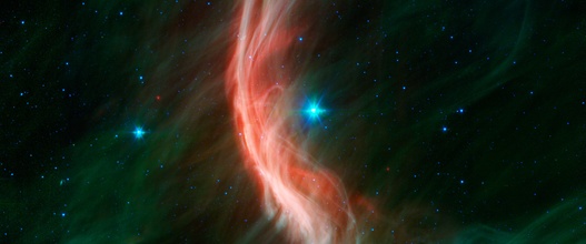 Ster-met-schokgolf, gefotografeerd door de Spitzer-ruimtetelescoop.